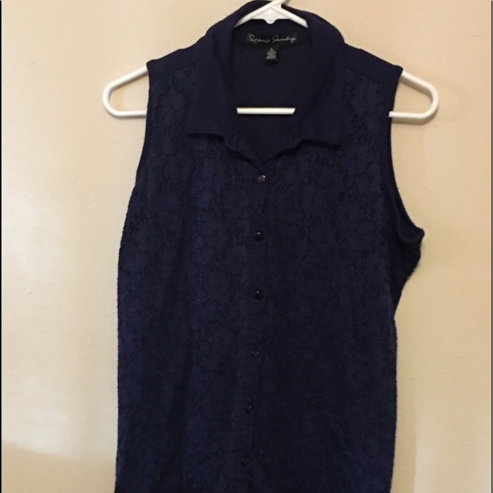 Top sleeveless with a collar